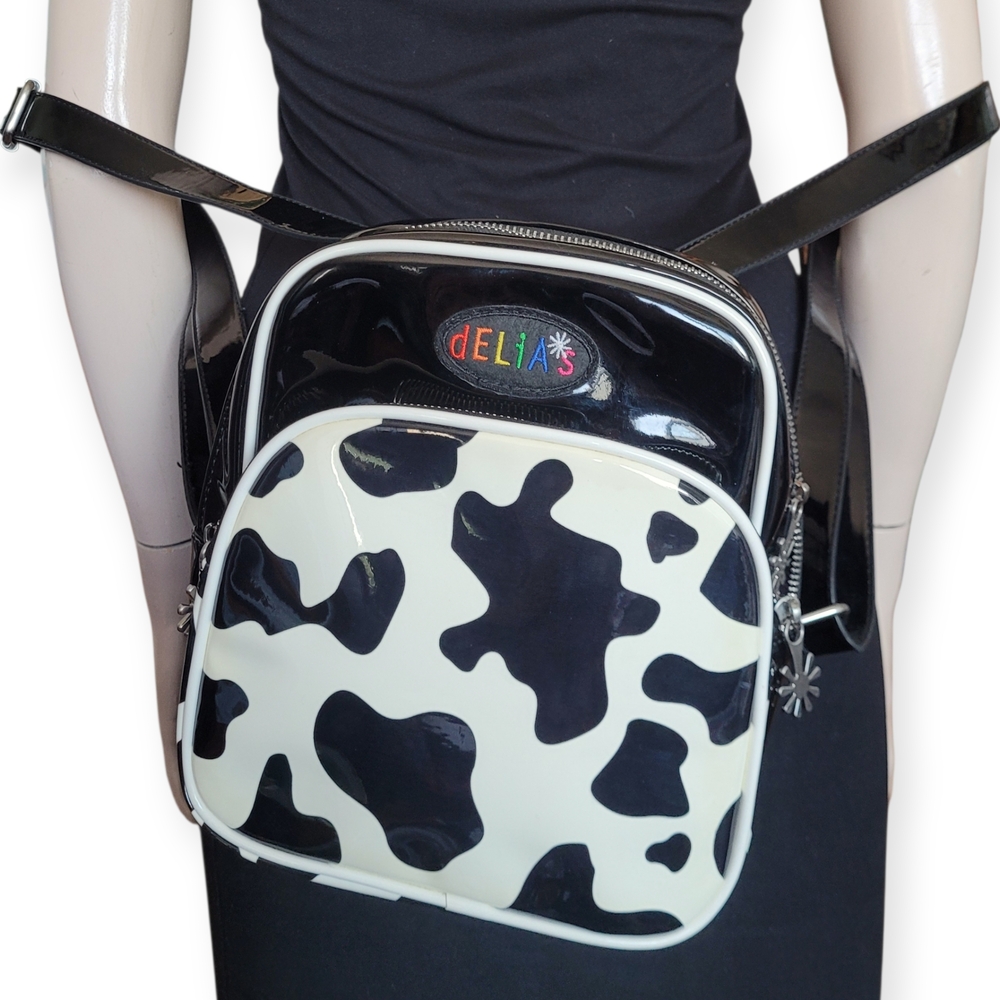 Dolls Kill X dELiA*s Black and White Cow Print Mini Backpack Y2K Style